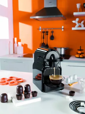 1 machine à Nespresso Magimix