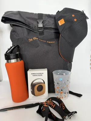 Sac goodies Orange (gourde, sac à dos, enceinte, casquette, stylo, tour de clé)